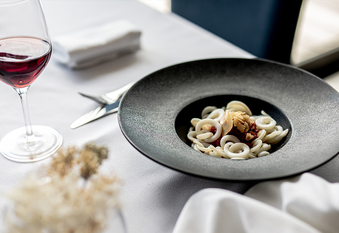 A dish and a wine glass